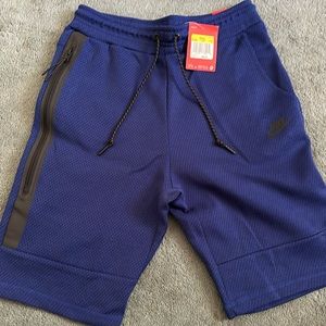 Nike tech fleece tapered fit shorts men’s small blue brand new with tags